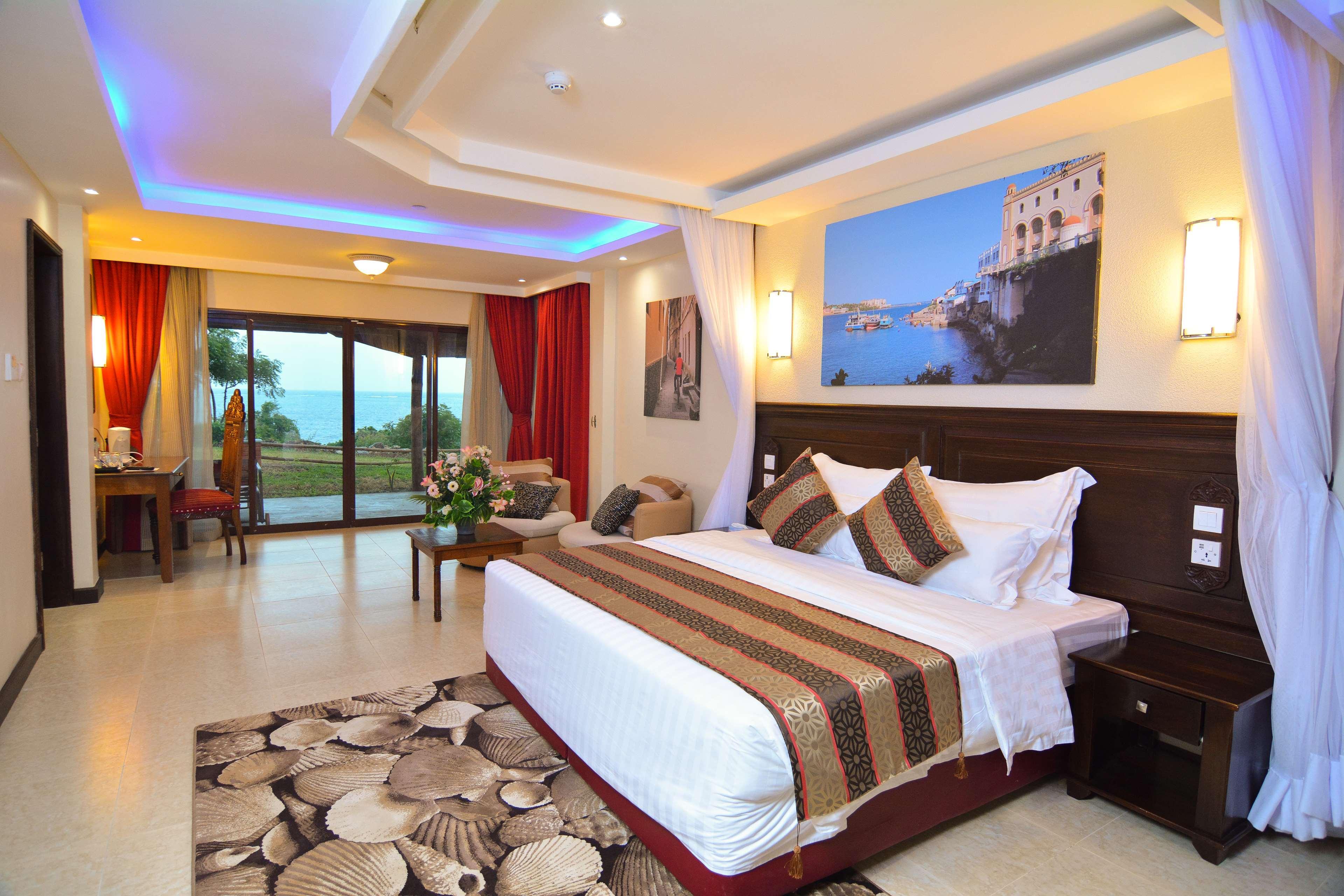 Prideinn Paradise Beach Resort & Spa مومباسا المظهر الخارجي الصورة A bedroom at the hotel